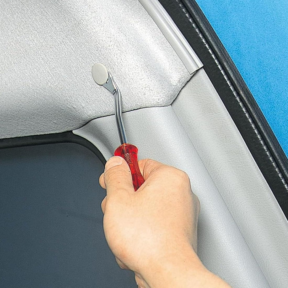 SUNFLAG removing a door panel clip demonstrating safe trim removal