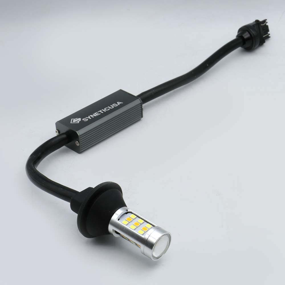 Syneticusa amber turn signal lit in traffic showing clear, attention-grabbing signaling