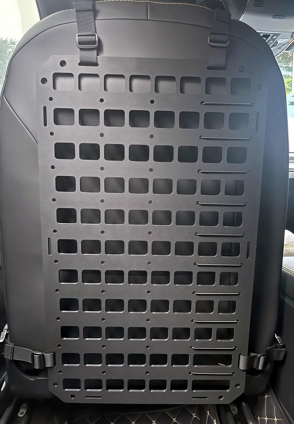 TACNEX panel in vehicle during road trip showing tidy gear storage and convenience
