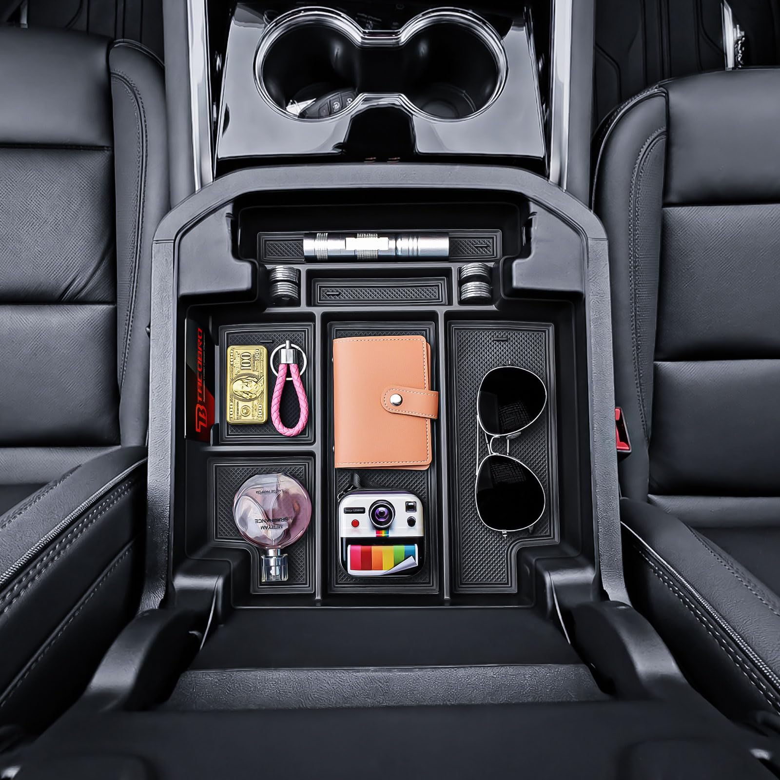 TACOBRO installed in GMC Yukon power sliding console for neat storage