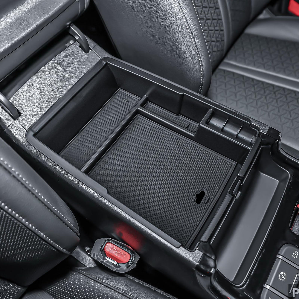 TACOBRO lower compartment holding cables and chargers for organized benefit