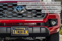 TACTILIAN frame installed on a sedan front offering tasteful patriotism