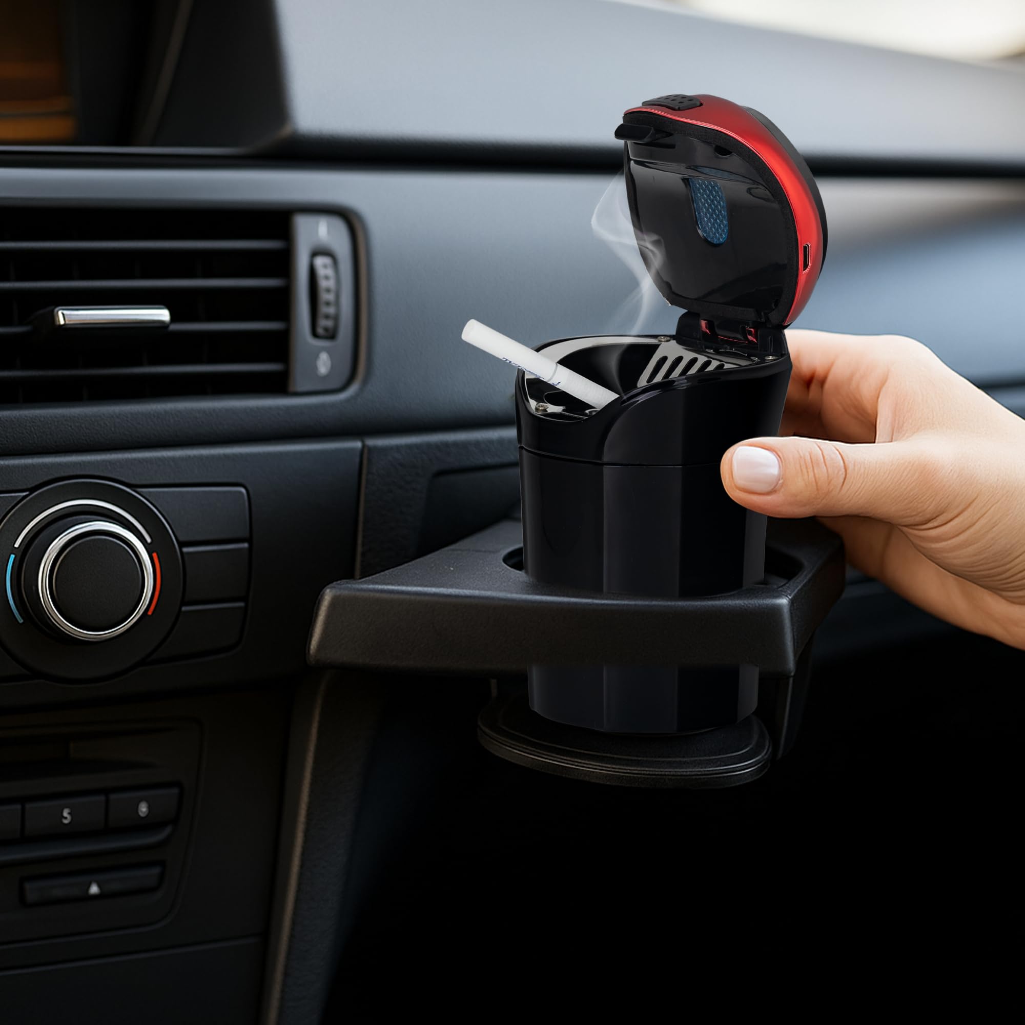 TAKAVU ashtray on center console showing tidy in-car storage