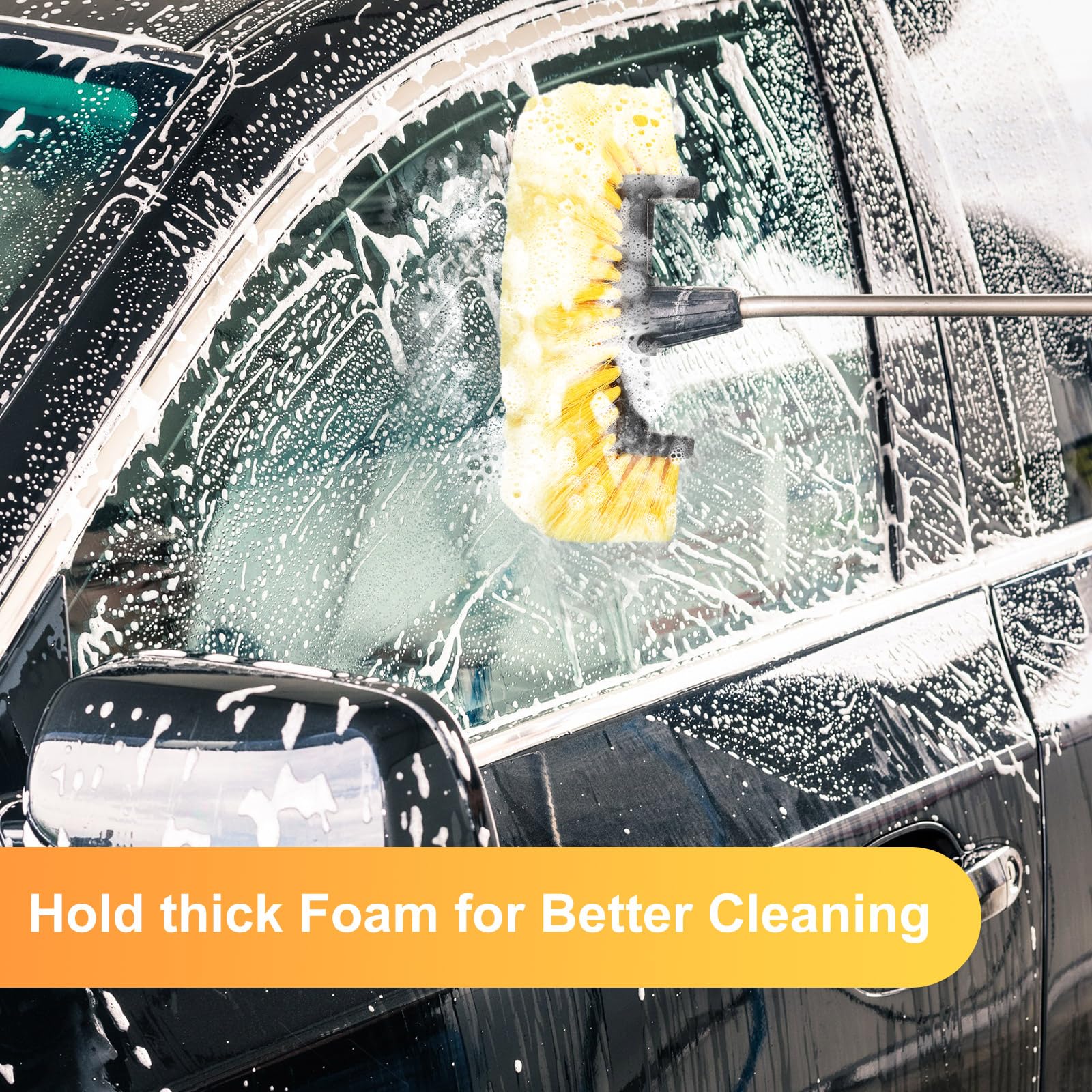 Tanlade brush in use on SUV exterior to speed up washing benefit