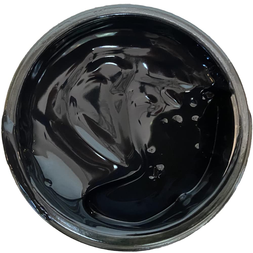 Close-up of Tarrago paste texture in open jar highlighting smooth, spreadable consistency
