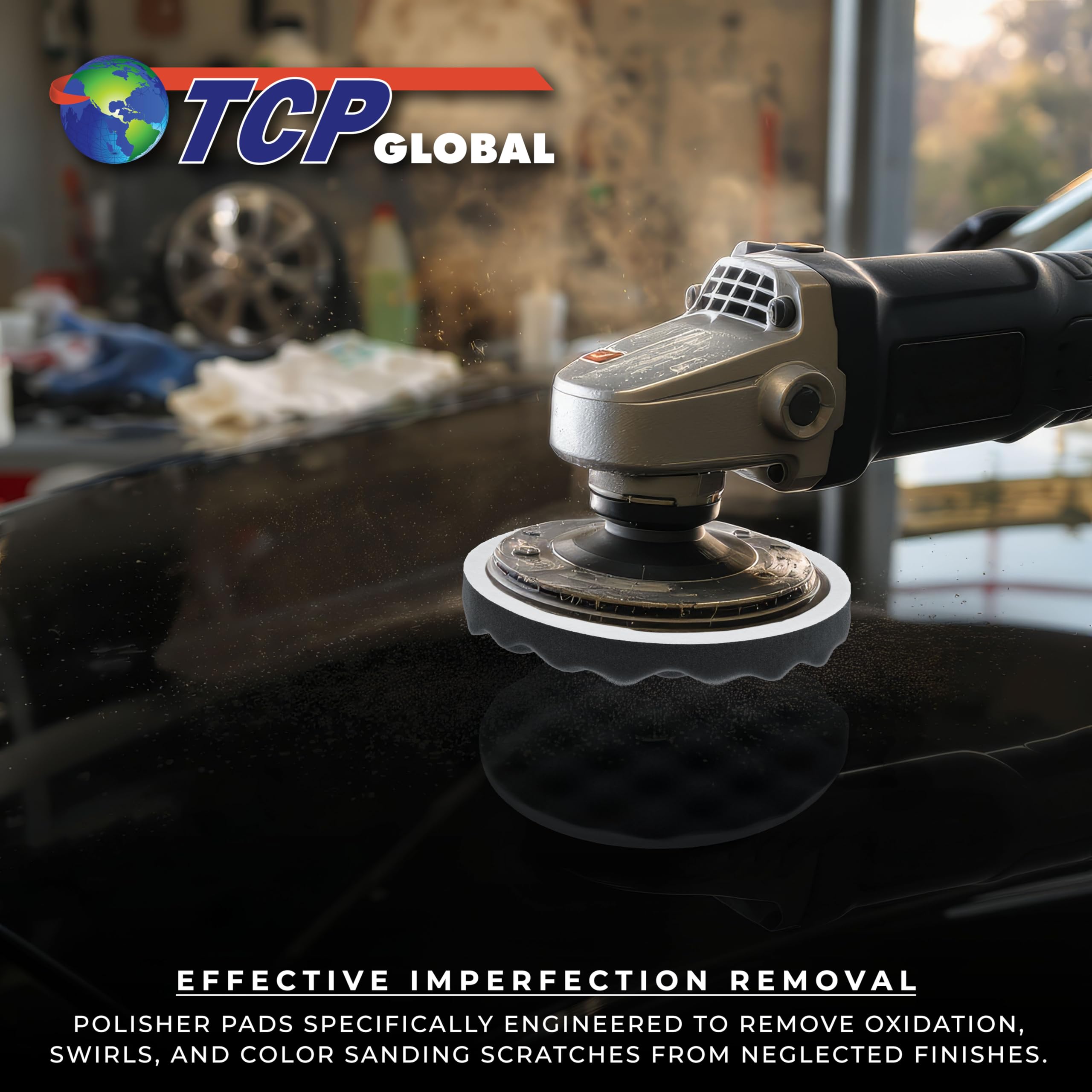 TCP Global pad held in hand for size comparison illustrating 8-inch scale and ergonomic handling benefit