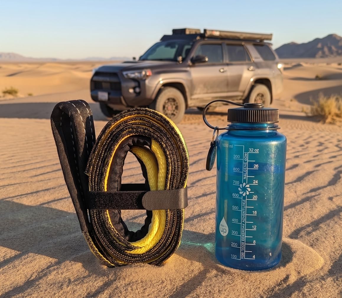TGL storage bundle next to water bottle showing compact, gear-friendly size