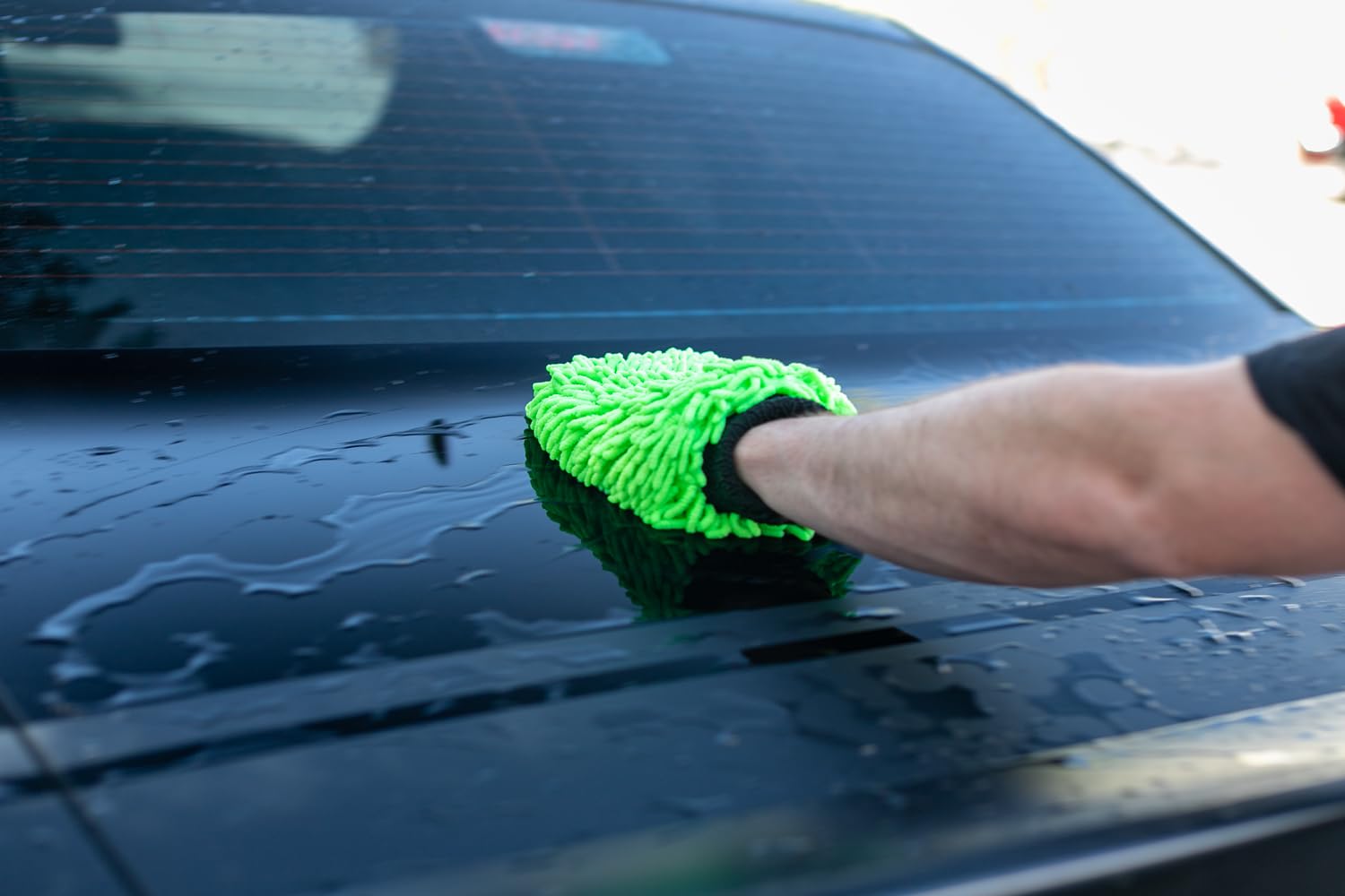 The Rag Company mitt hanging to dry by loop, preserving microfiber performance