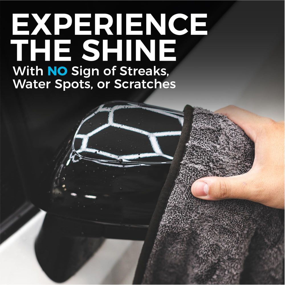 The Rag Company Gauntlet removing water from a side mirror without scratching