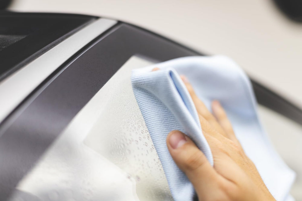 The Rag Company towel used on bathroom mirror showing streak-free reflection