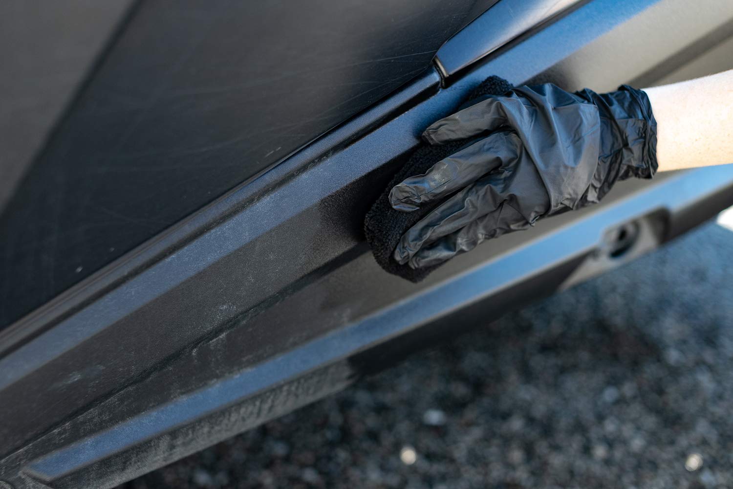 The Rag Company black nitrile gloves packaged to protect hands and prevent contamination