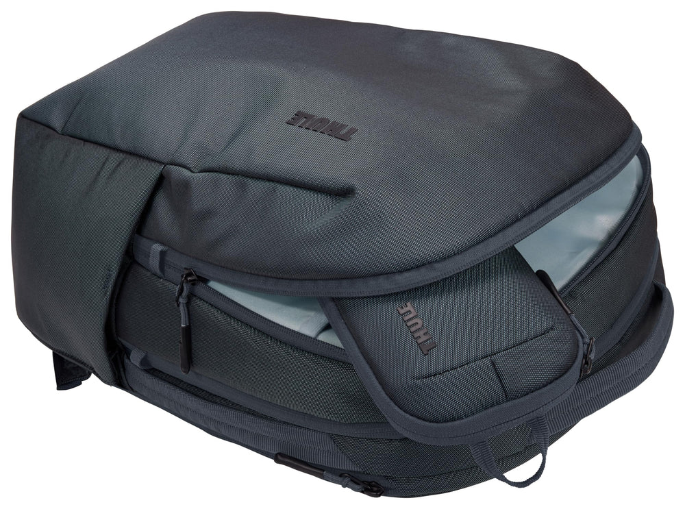 Thule inside backpack seat pocket showing space-saving convenience
