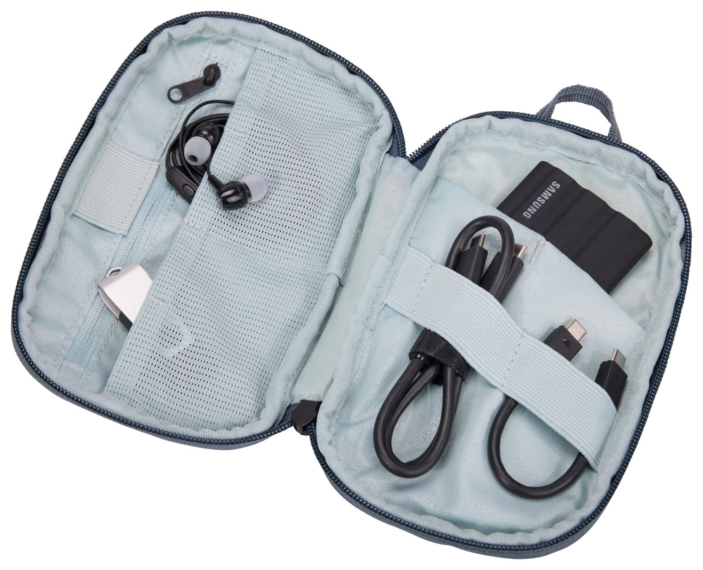 Thule next to smartphone illustrating small size and easy fit