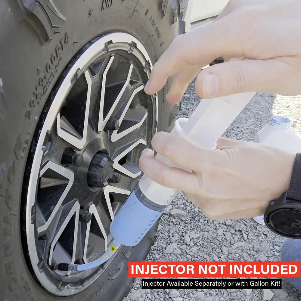TireJect gallon next to a ruler showing scale and volume for multiple tires