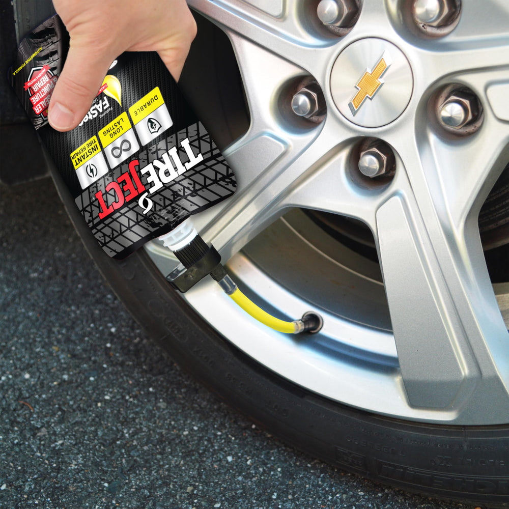 TireJect sealant being applied through valve stem for immediate roadside fix