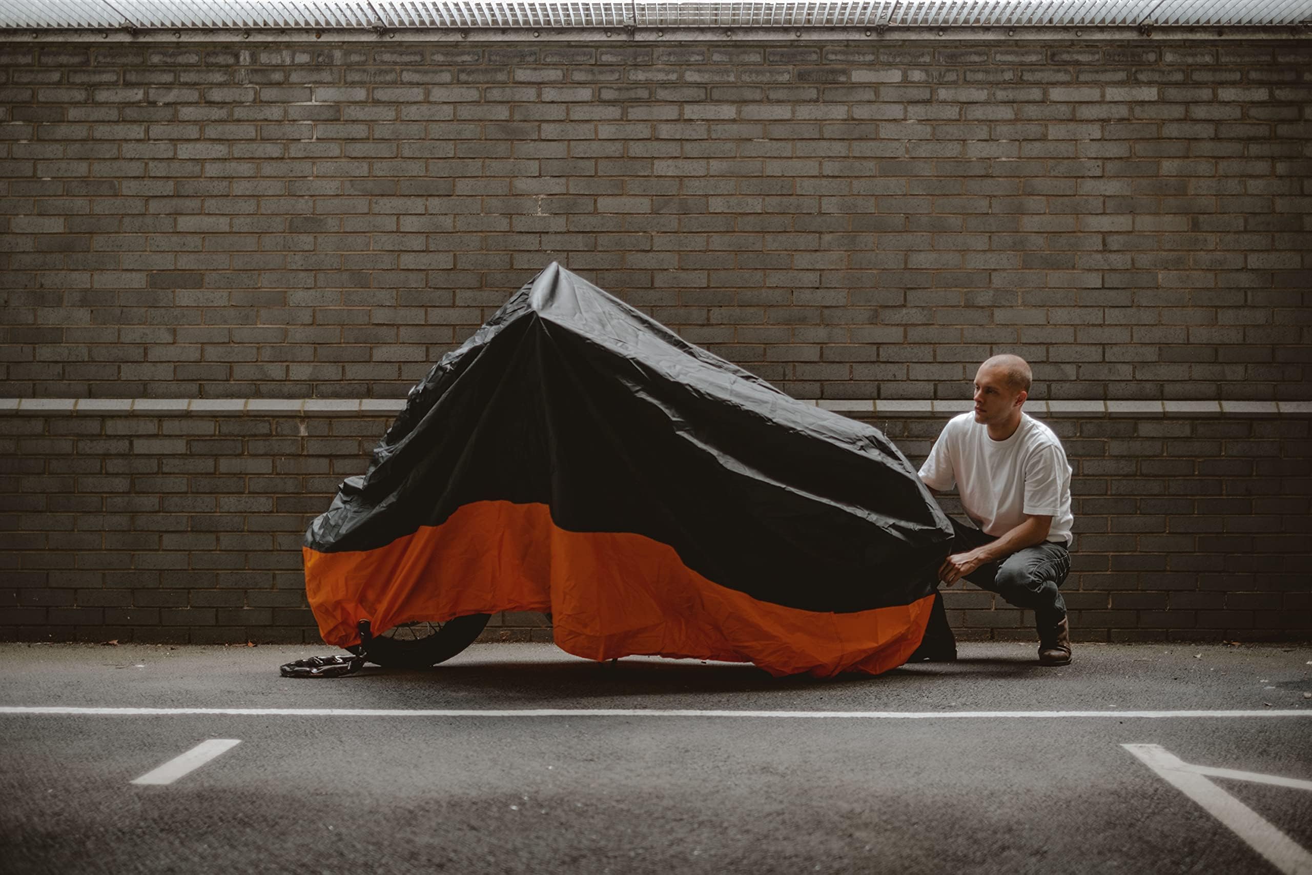 Tokept cover on parked motorcycle in driveway illustrating outdoor protection use