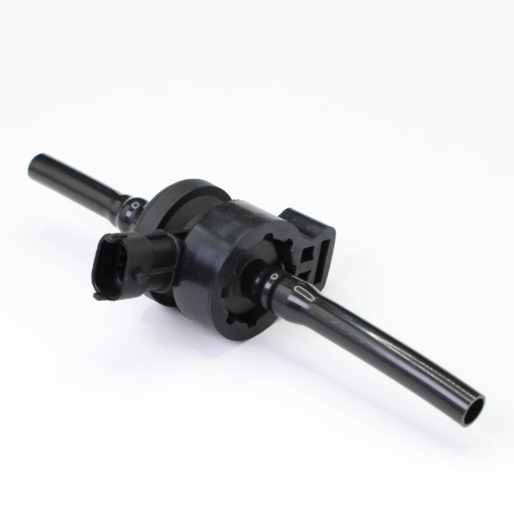 TOPMV purge valve beside ruler scale showing compact dimensions and OEM match