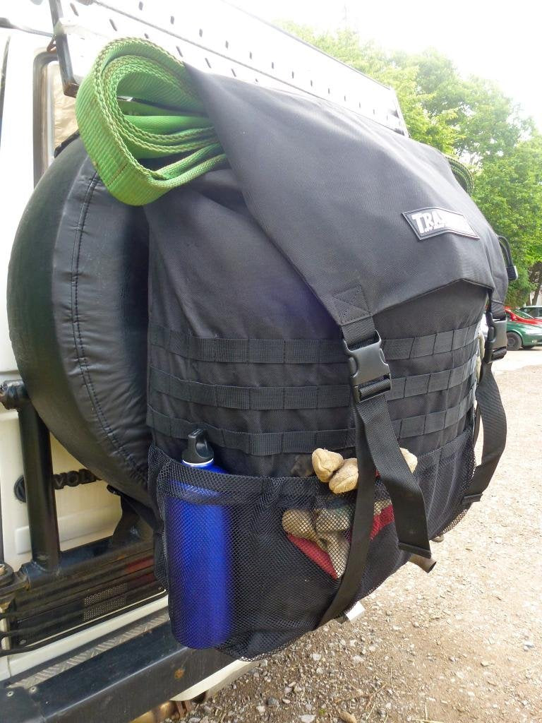 Trasharoo mounted on spare tire demonstrating secure off‑road attachment