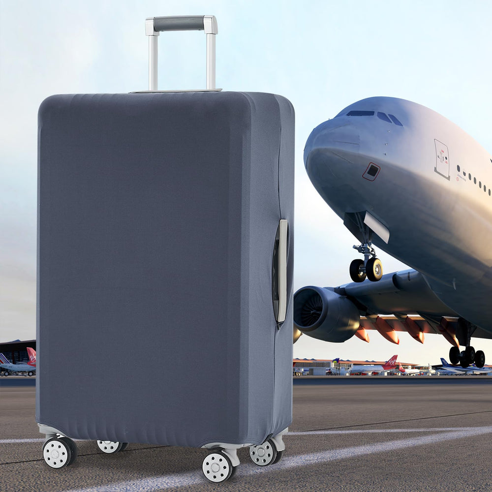 TRAVELKIN cover fitted on hard-shell luggage showing clean fit