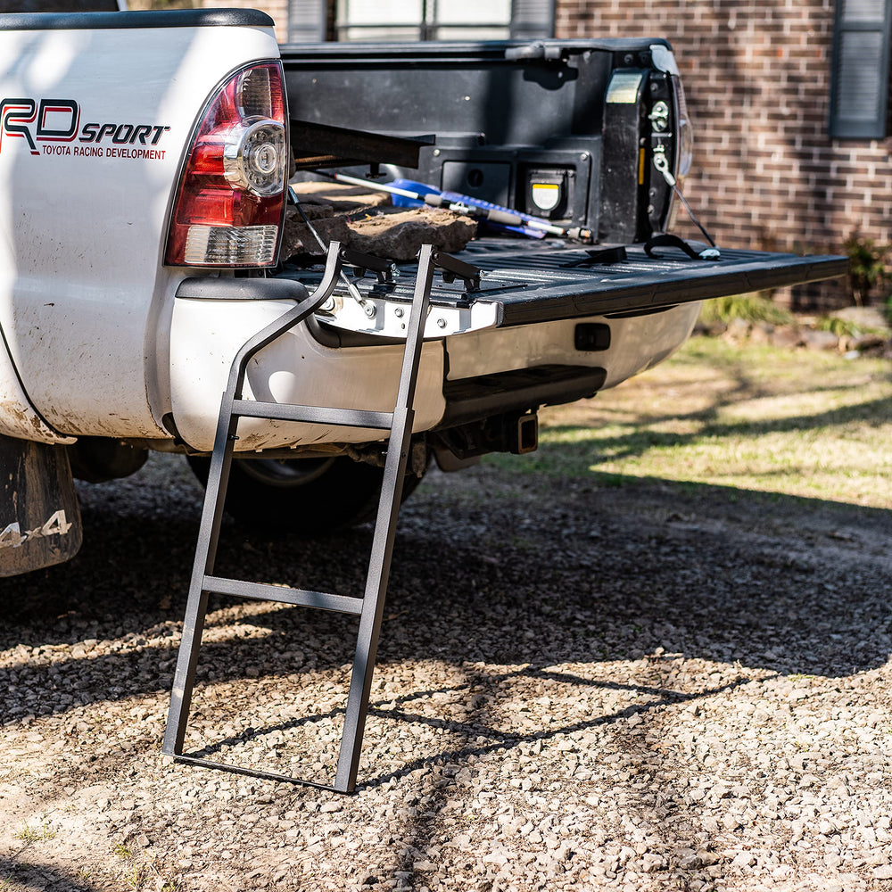 Traxion ladder on pickup in outdoor setting showing practical everyday use benefit