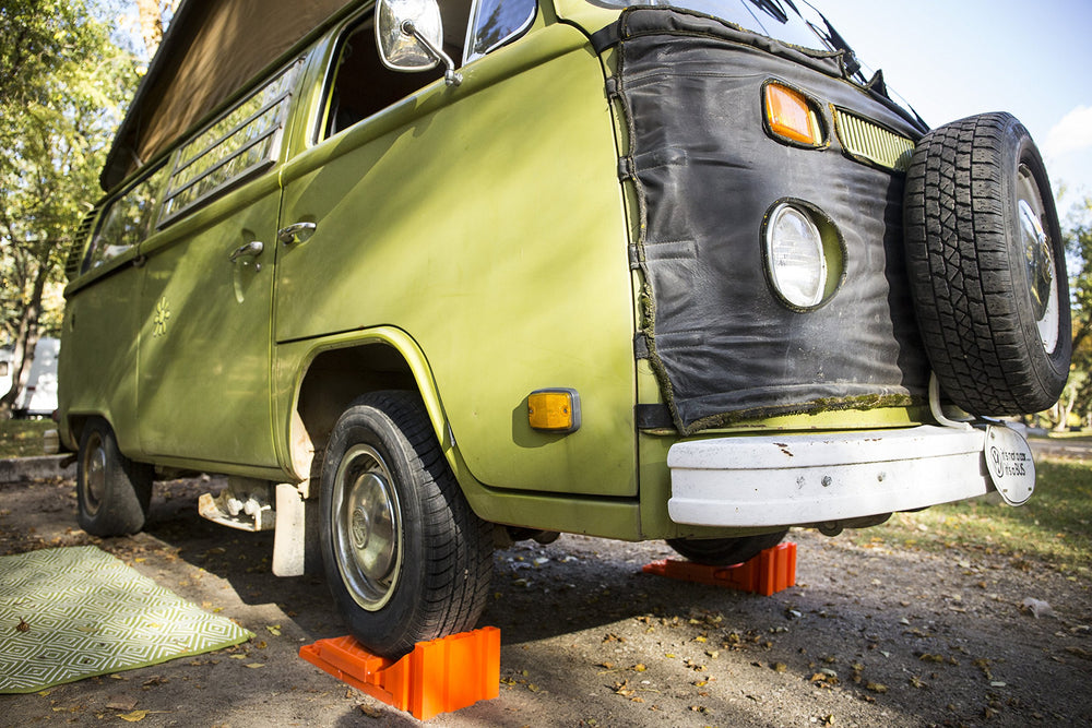Tri-Lynx chock in campsite scene demonstrating effortless RV setup