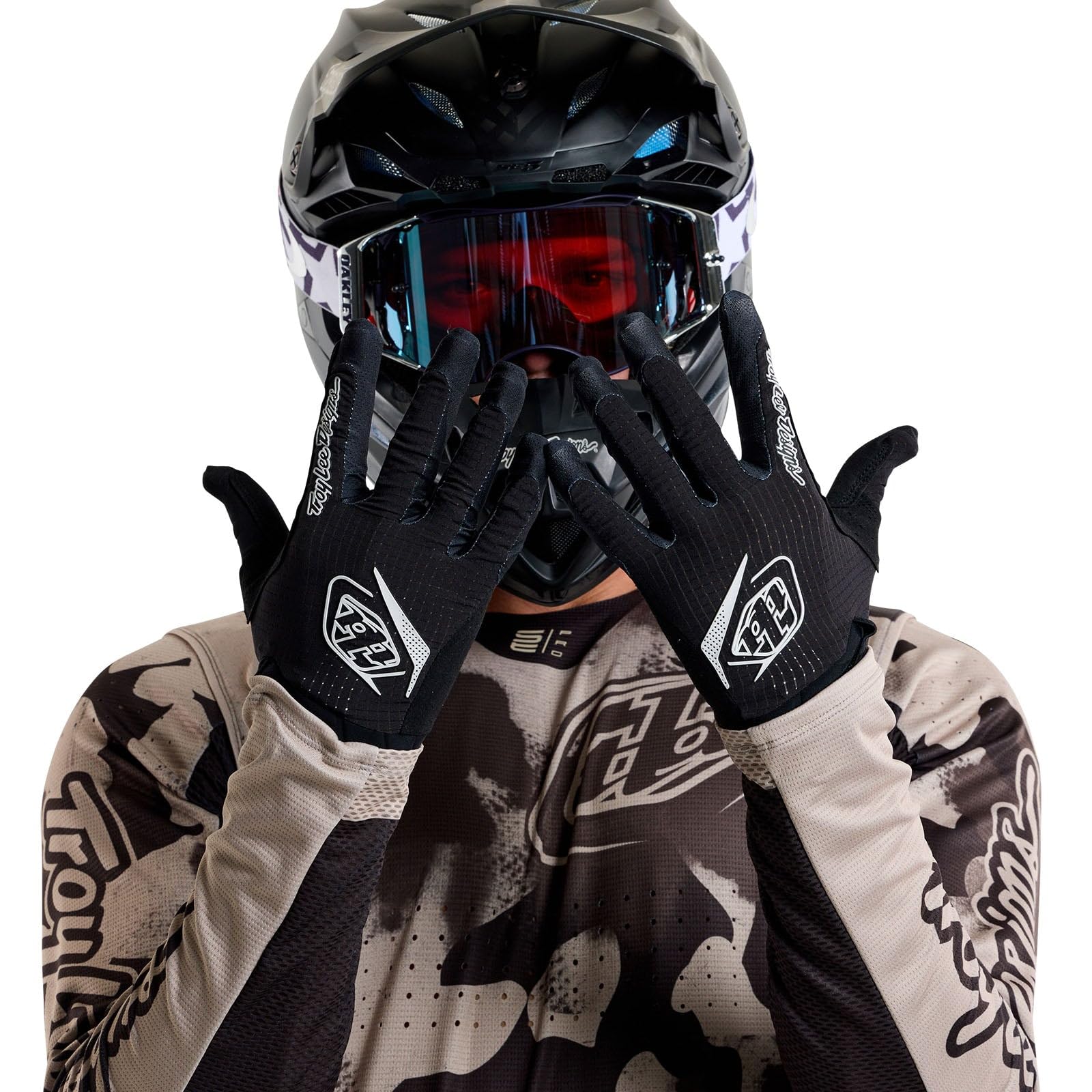 Troy Lee Designs Air Glove beside ruler showing large size and accurate fit for hand scale