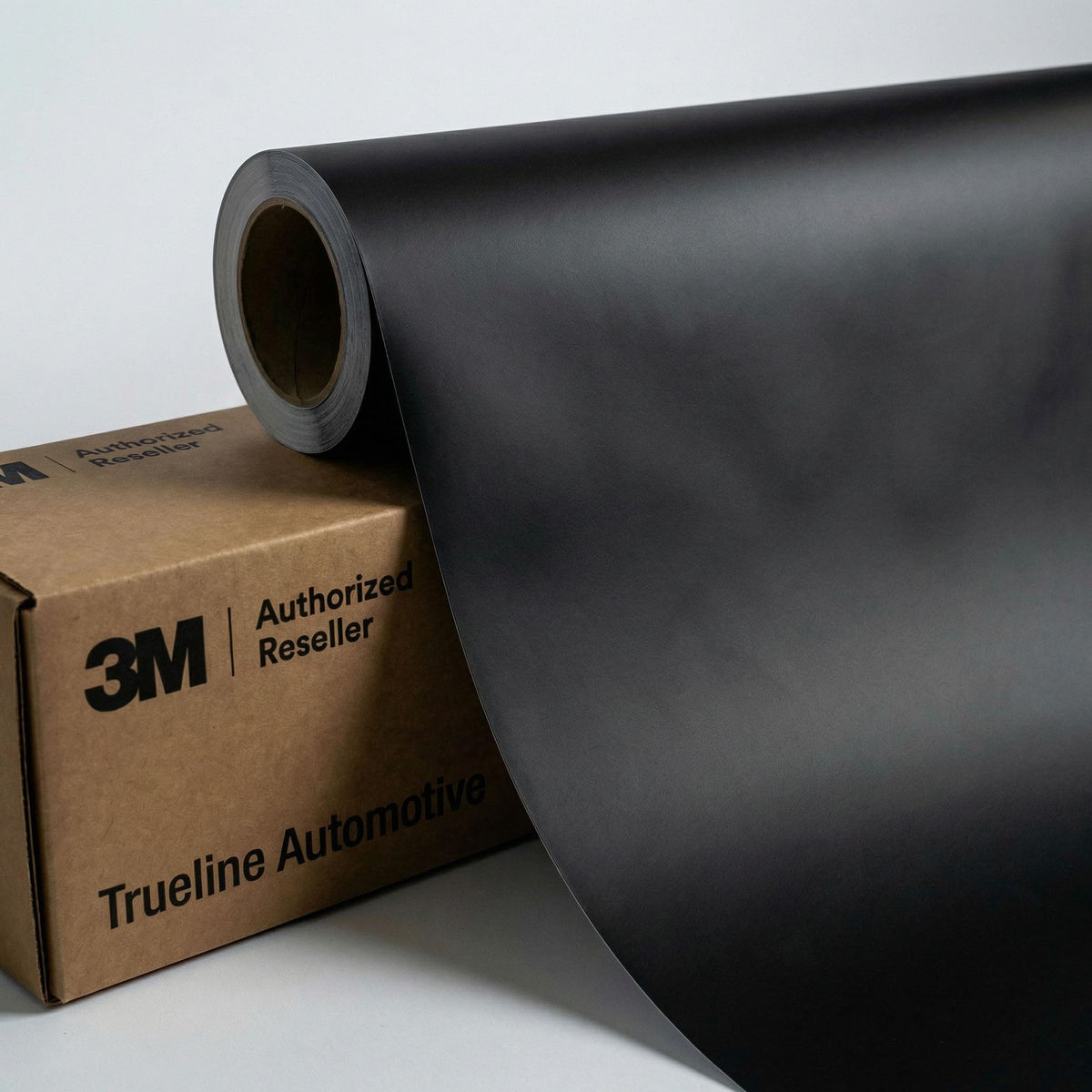 TRUE LINE Automotive front roll of 3M 2080 matte black showing clean cutter edge and ready-to-use benefit