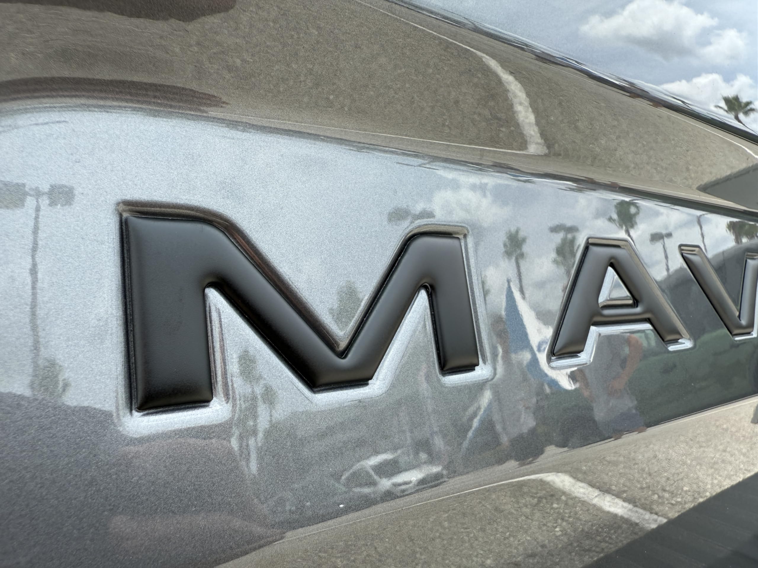 TufSkinz adhesive backing closeup showing 3M automotive bond strength