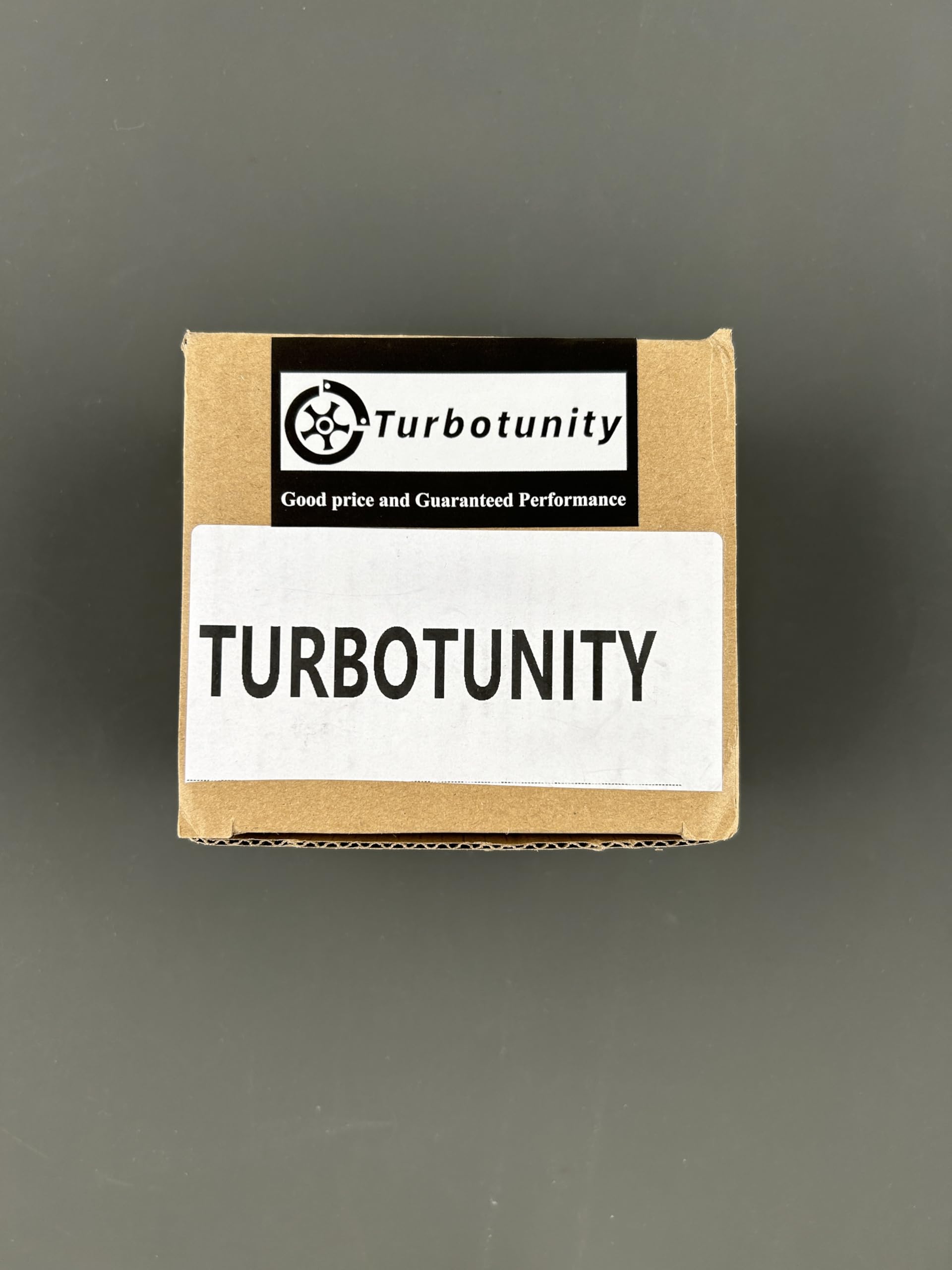 TURBOTUNITY in a workshop setting with tools, ideal for DIY small-engine repairs