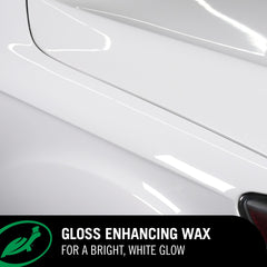 Turtle Wax poured onto cloth ready for section-by-section application