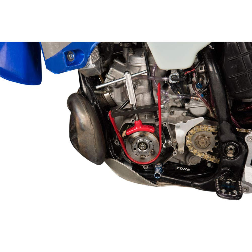 TUSK flywheel holder close-up on jaw and adjustment detail, offering secure rotor contact for safer torque