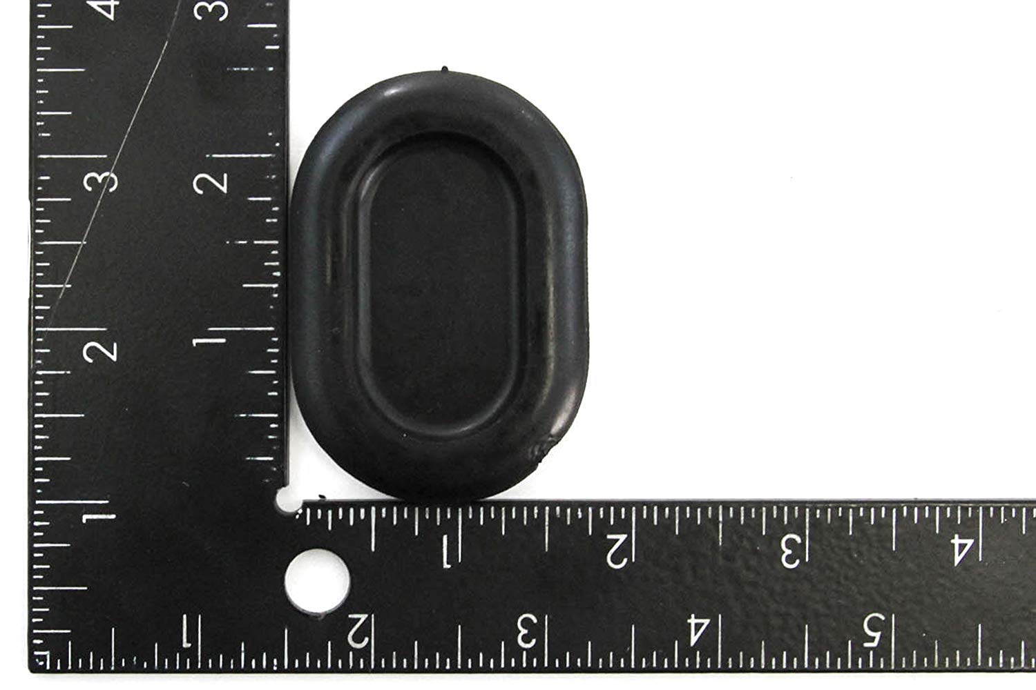 Upper Bound plug beside a ruler showing dimensions for accurate fit