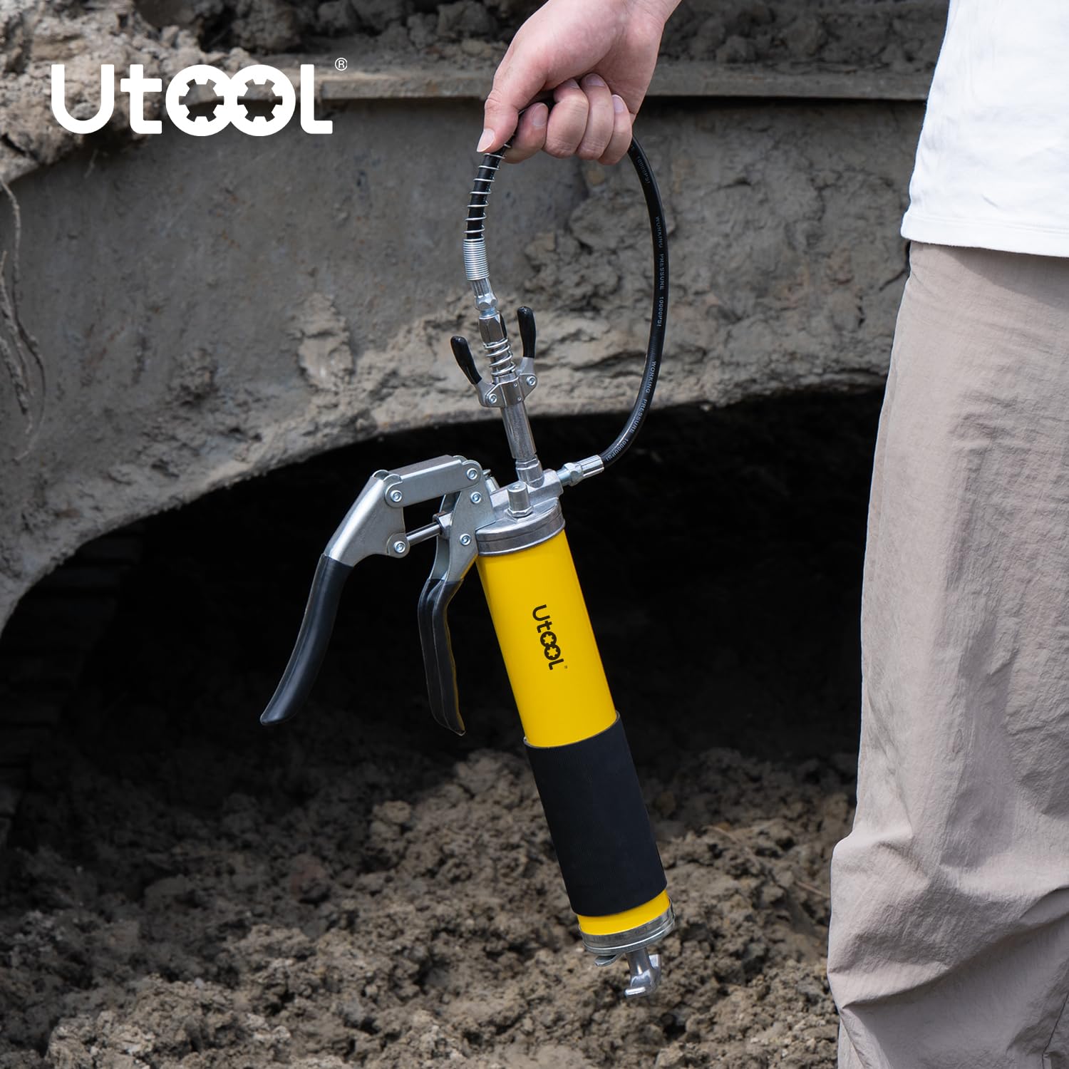 UTOOL loop and lock storage with coiled hose preventing messy grease transfer