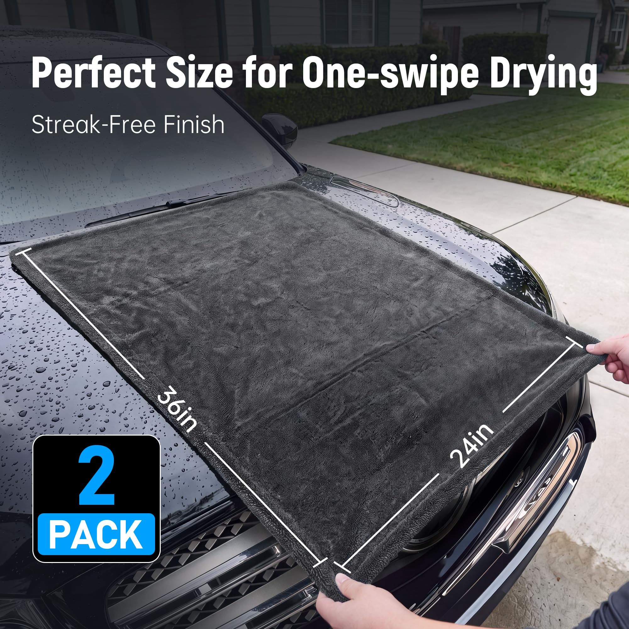Veco towel held in hand to show 36x24 size for faster drying