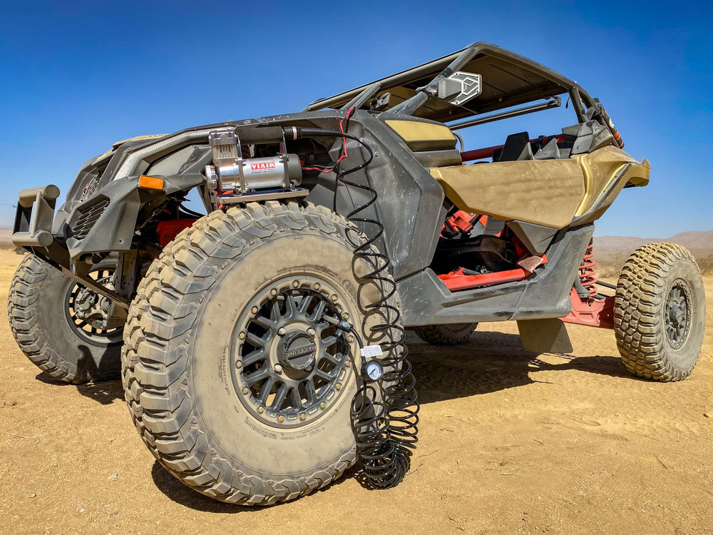 VIAIR 300P layout with accessories showing included hoses, clamps, and compact storage