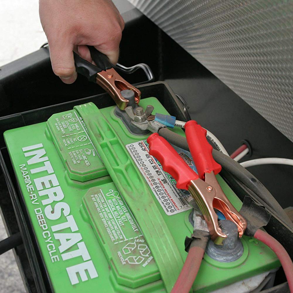 VIAIR compressor connected to vehicle battery showing secure mounting and power setup