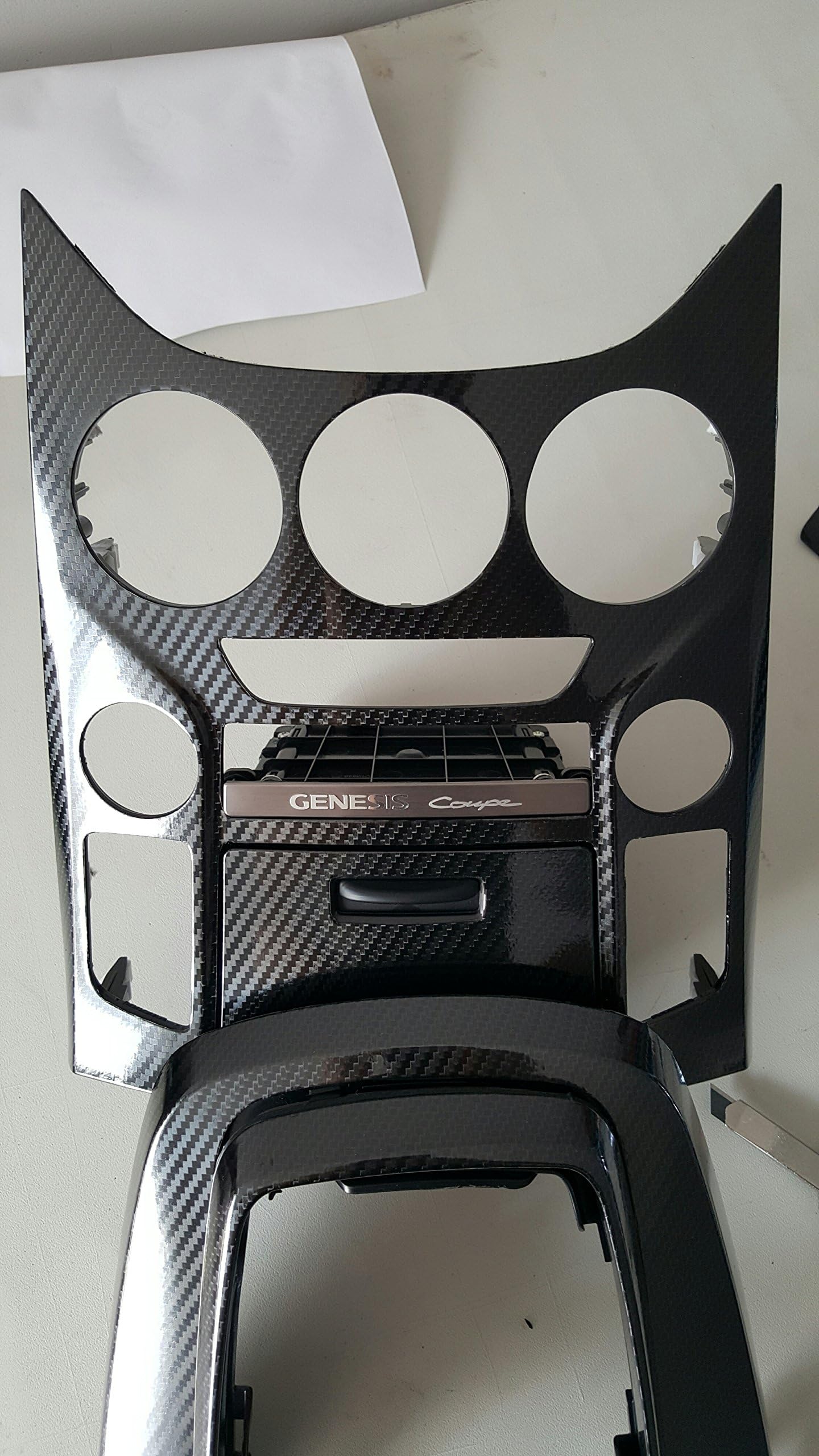 VViViD wrapped console in a car interior showcasing style