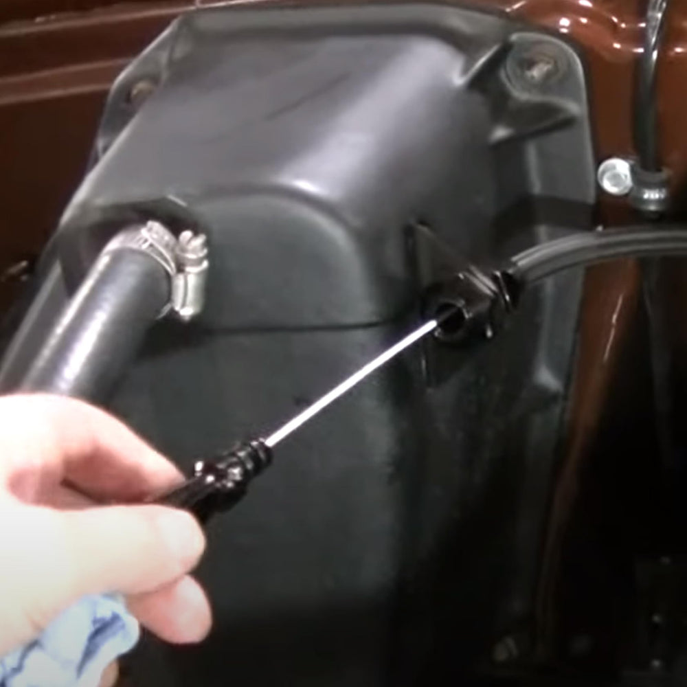 Wauebuly dipstick next to a tape measure showing length for correct LS engine fitment