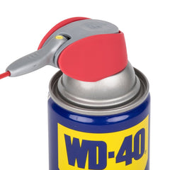 WD-40 straw flipped down producing a wide spray to coat chains and surfaces