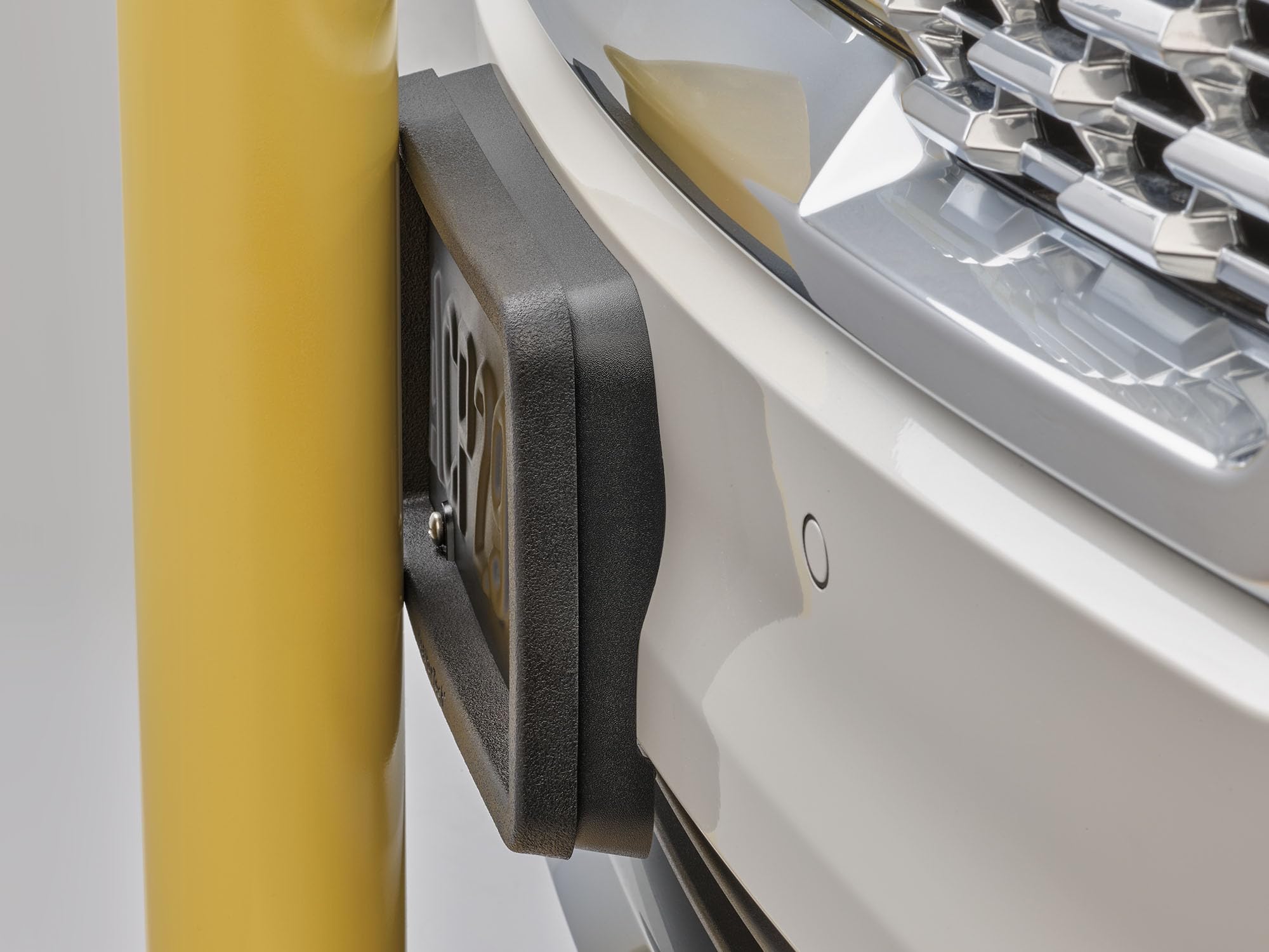 WeatherTech BumpFrame installed on vehicle front demonstrating bumper protection