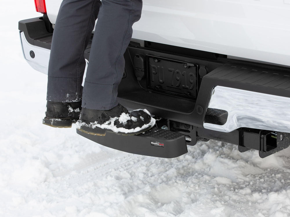 WeatherTech BumpStep XL installed on truck protecting rear bumper