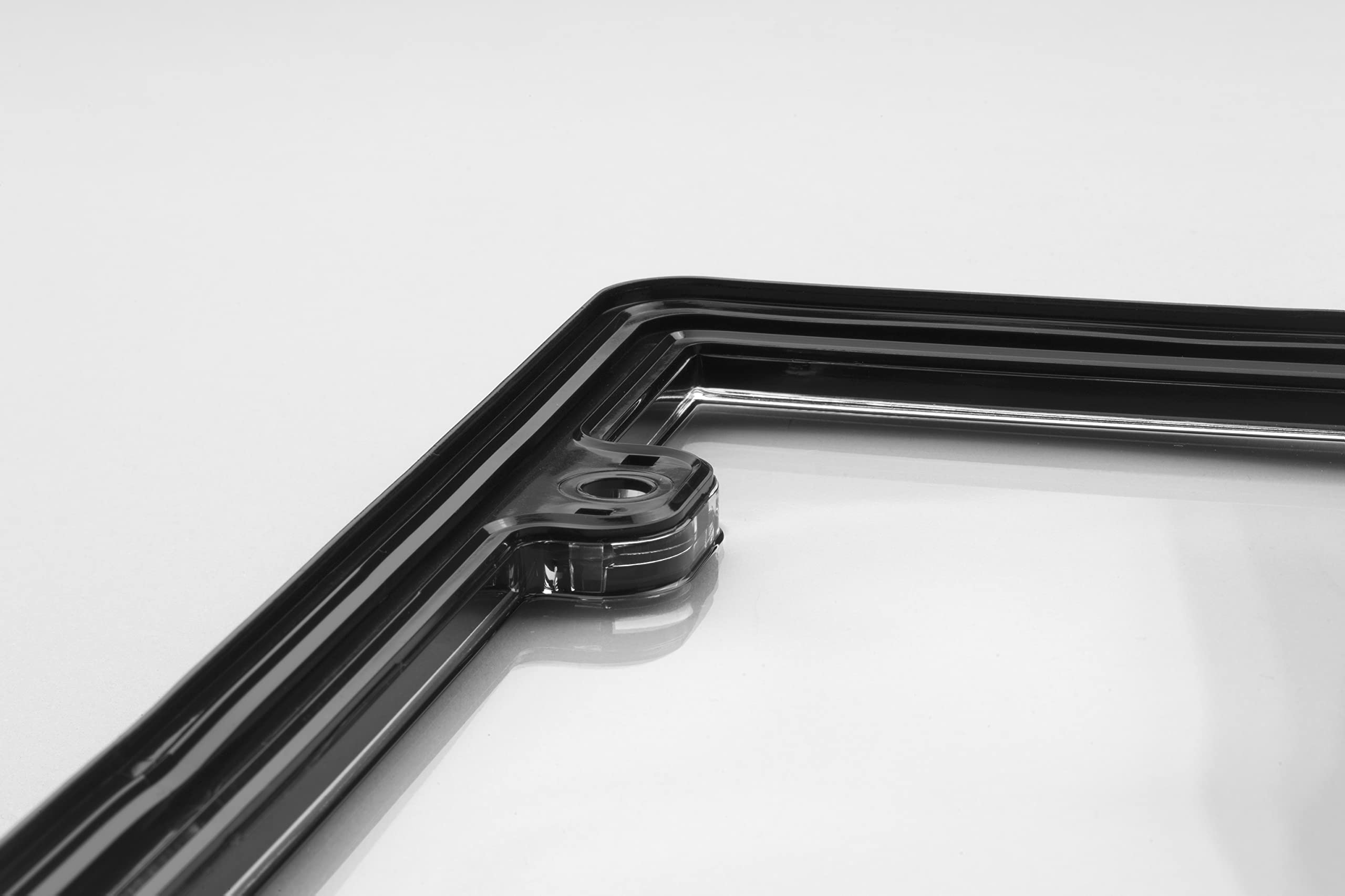 WeatherTech ClearCover side profile showing stepped lip and snug seal for moisture protection