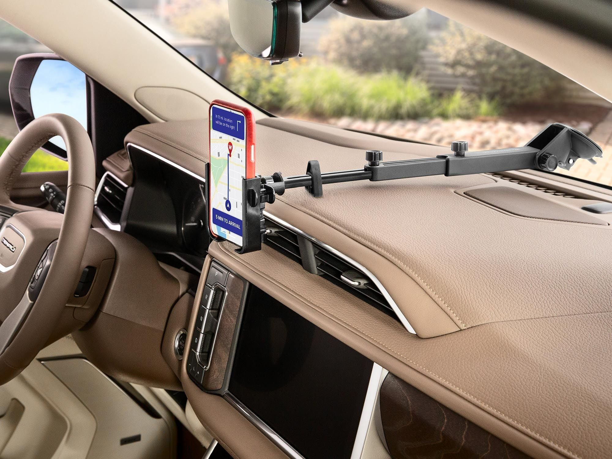 WeatherTech WindshieldFone cradle close-up showing adjustable width benefit