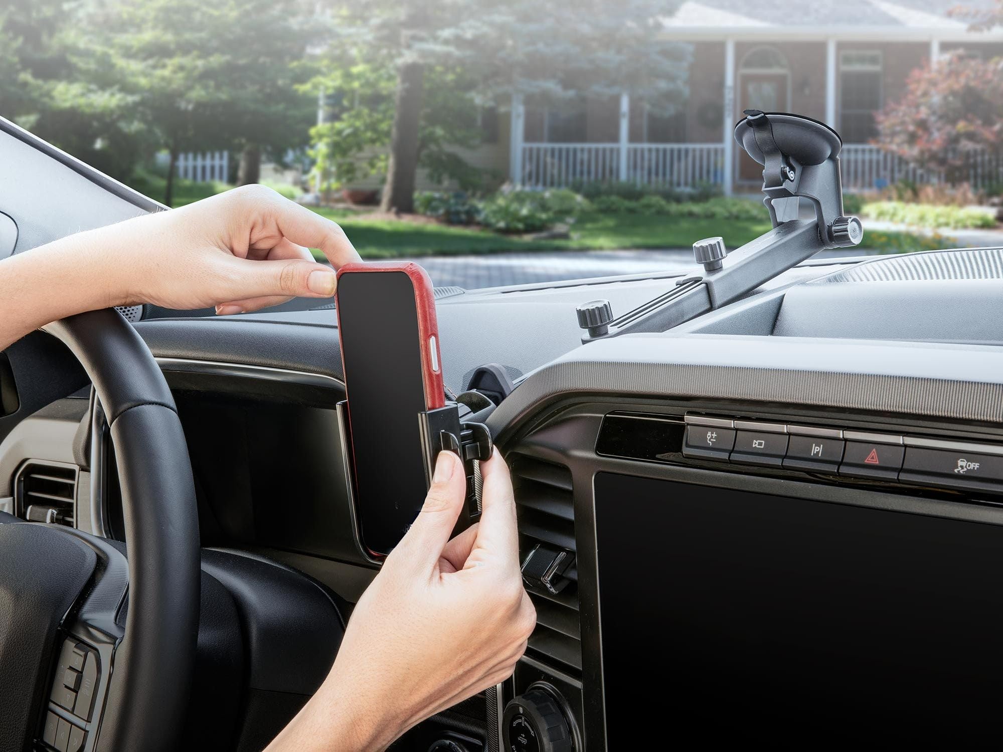 WeatherTech WindshieldFone scale comparison with phone showing size fit