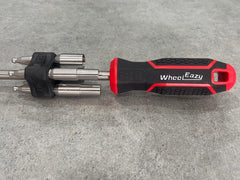 WheelEazy CNC-machined adaptor pegs displayed with storage holder benefit