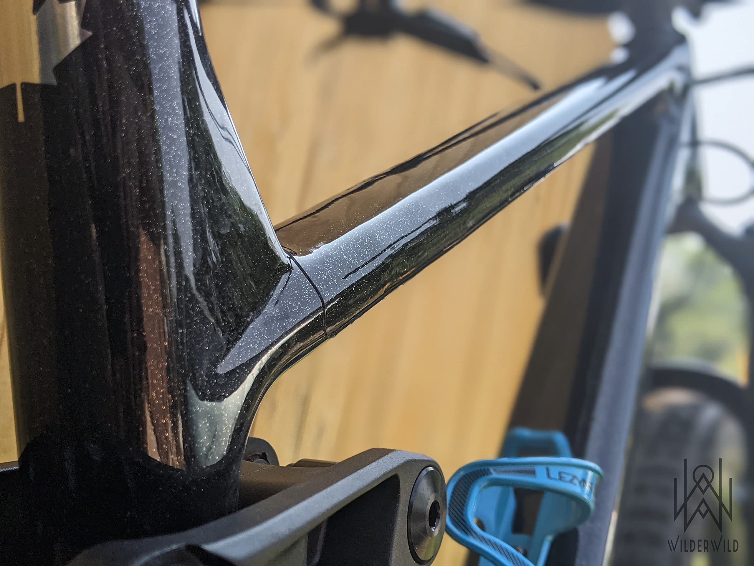 WilderWild on a mountain bike in trail use demonstrating outdoor protection benefits