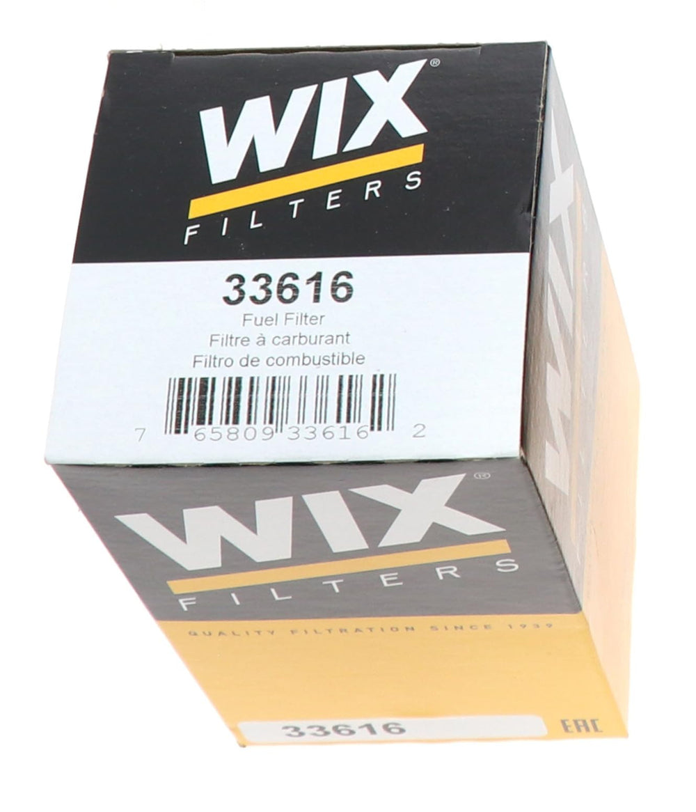 Technician installing WIX 33616 demonstrating straightforward spin-on replacement and time savings