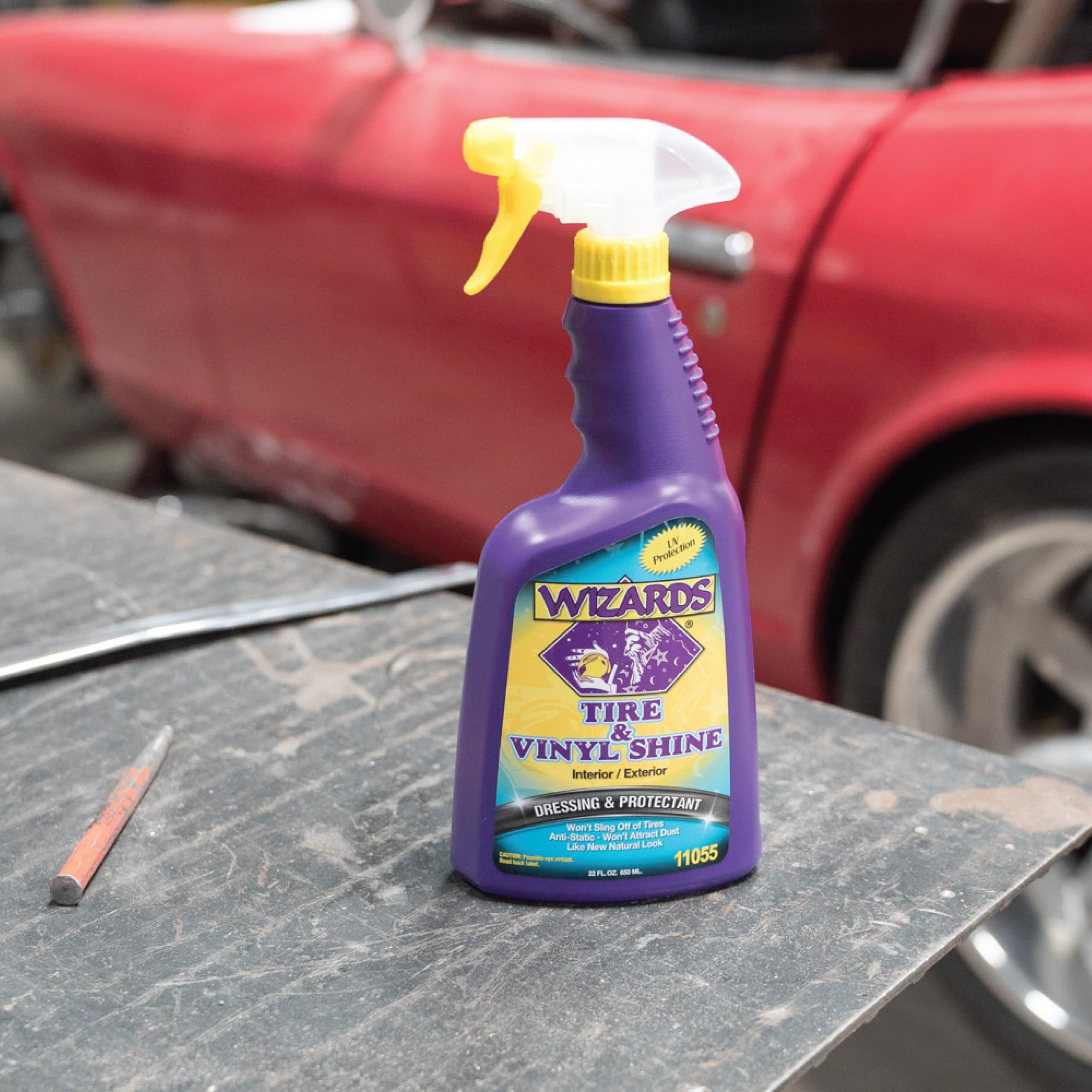 Wizards 22oz bottle next to common objects to show size and convenience