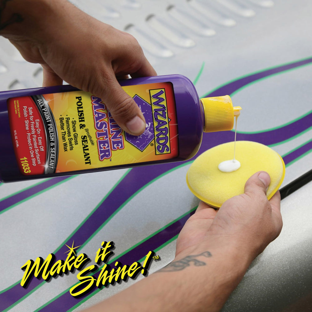 Wizards polish applied on red car panel revealing improved clarity