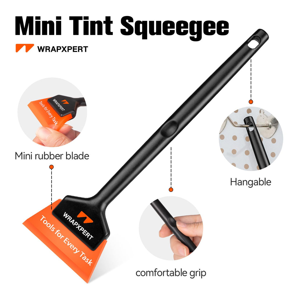 WRAPXPERT squeegee in use on car quarter window smoothing film for bubble-free finish